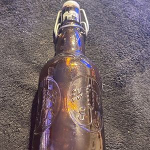 Grolch Lager Beer brown Glass bottle W/Porcelain Cap bale top Holland. Vintage